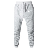 2019 New Men Joggers Brand Male Trousers Casual Pants Sweatpants Jogger Grey Casual Elastic Cotton GYMS Fitness Workout Dar XXXL